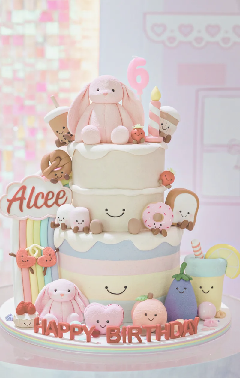 Cute pastel kawaii themed birthday cake with fondant characters
