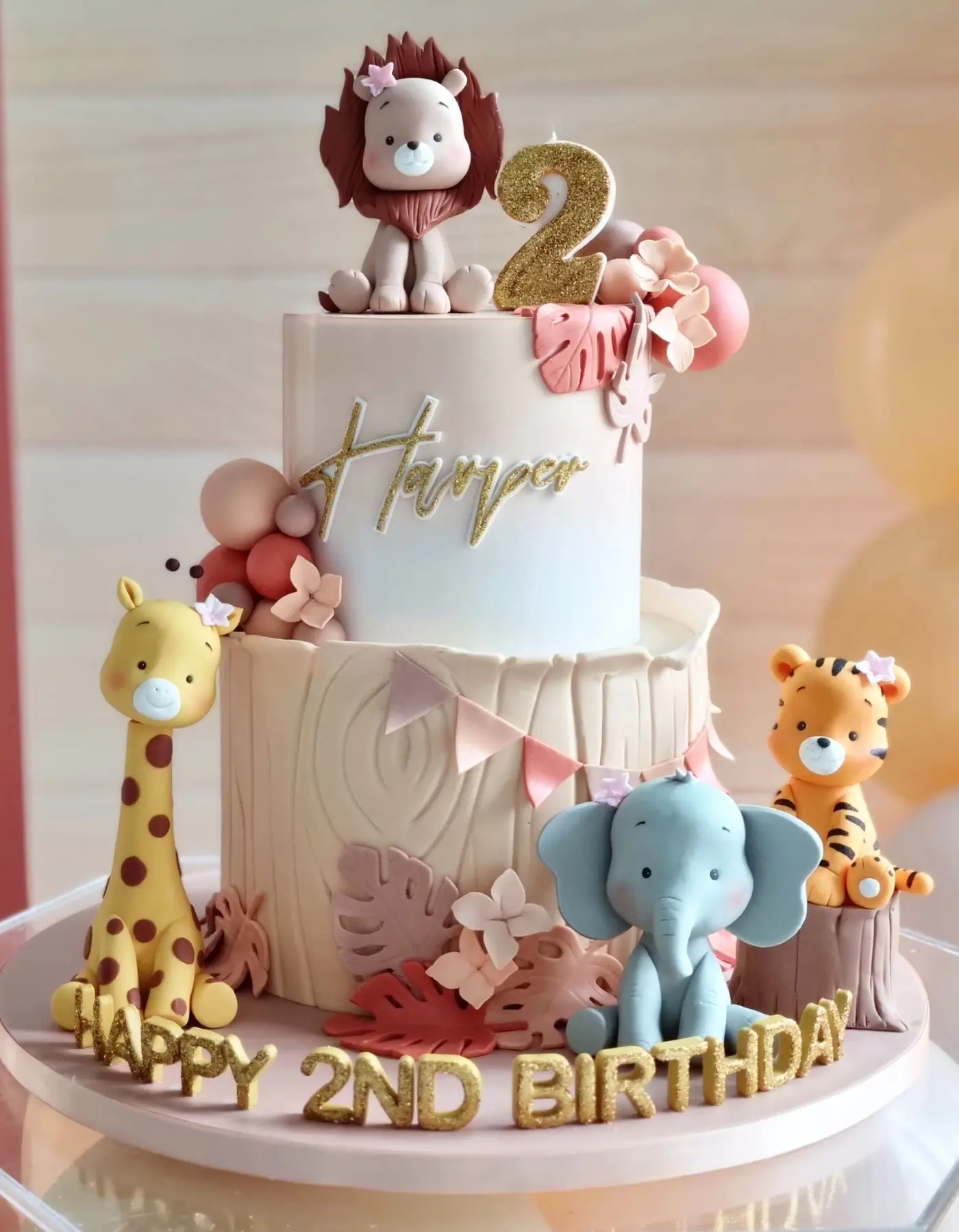 Safari animal 2nd birthday cake with fondant lion, elephant, giraffe and tiger